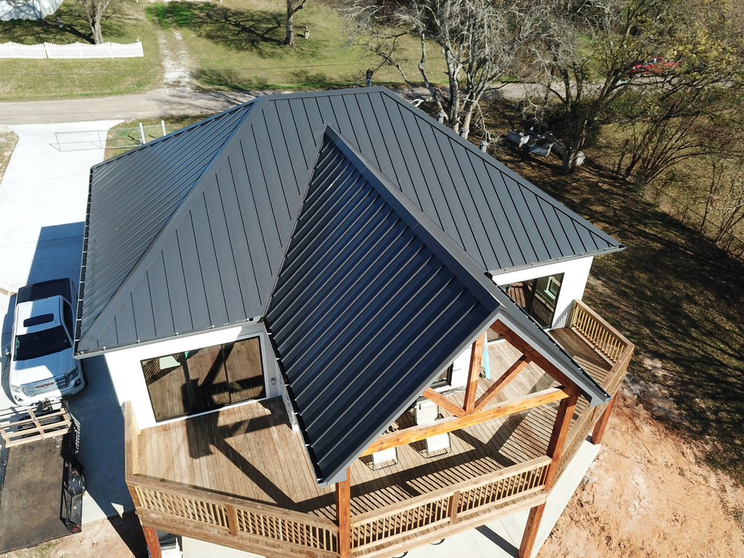 Hill Country red metal roofing project